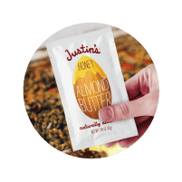 Icon thumbnail of hand holding Justin's Honey Almond Butter Spread Squeeze Pack