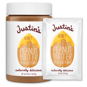 Justin's Honey Peanut Butter Spread jar 16 oz. beside Justin's Honey Peanut Butter Spread Squeeze Pack 1.15 oz.